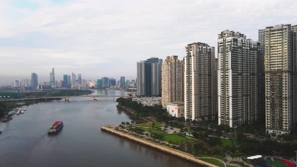 Drone Footage Of Saigon River And Downtown Of Ho Chi Minh City, District 1. alt