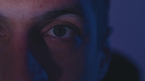 Closeup Reflection in the Eye of Light From the Screen alt