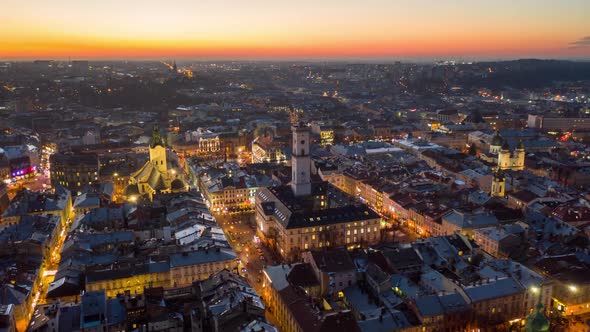 Flight Above the Roofs on Sunrise. Old European City. Ukraine Lviv City