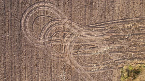 Circular Tracks From Agricultural Machinery in the Field Aerial View alt