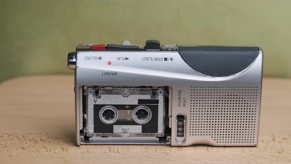 Portable Retro Tape Recorder with Micro Cassette Rec Sound on Yellow Background alt