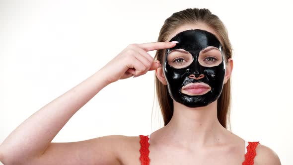 Girl Dried Peel Off Mask on Face alt