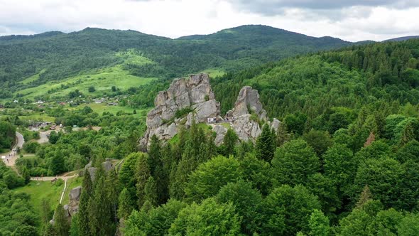 Aerial Drone View of Famous Ukrainian Medieval Cliffside Tustan Fortress Ruins alt