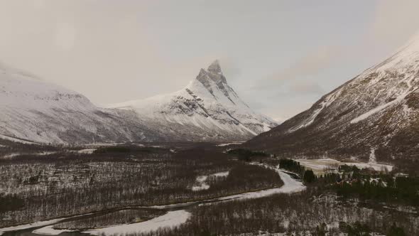 Aerial natural winter landscape Signaldalen valley in northern norway, Otertinden mountain peak on t alt