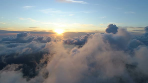 Flying Above the Clouds During Sunset