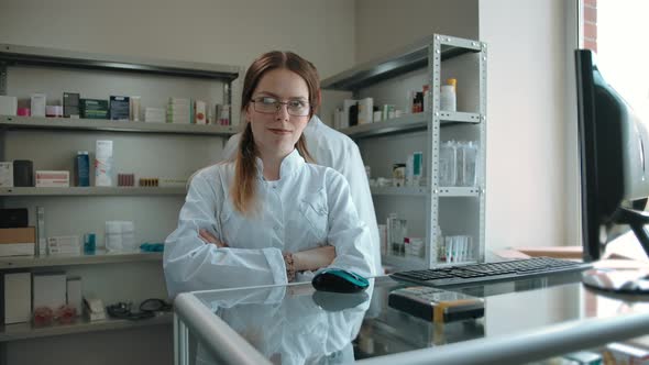 Pretty Woman Looking at the Camera at the Pharmacy alt