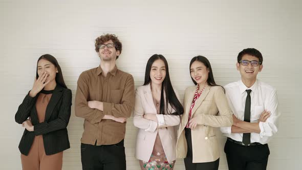 The office worker standing smiling, laughing, concept of happy people. alt