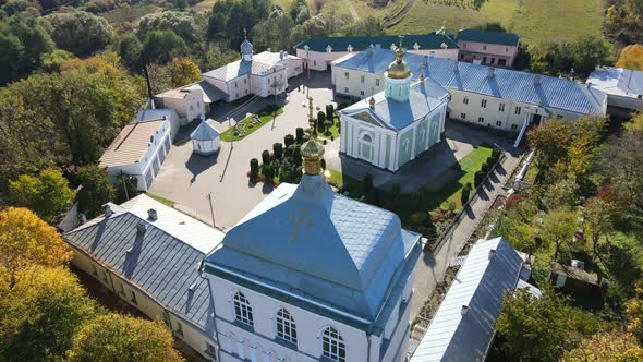Aerial Shot Village Derman. Holy Trinity Convent. Ukraine alt