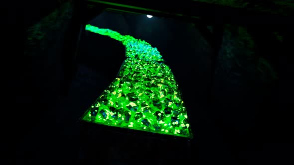 Multiple minecarts full of uranium ore gems are going through the tunnel. 4KHD alt