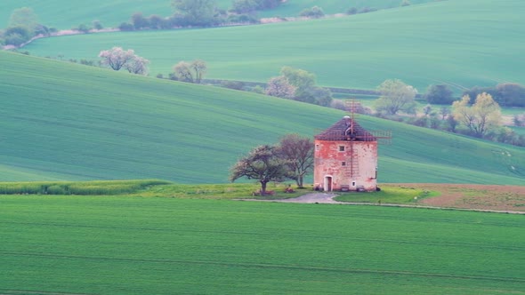 Picturesque Rural Landscape with Old Windmill