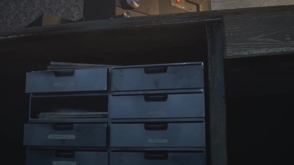 Retro room with vintage radio station standing on the desk under obsolete lamp. alt