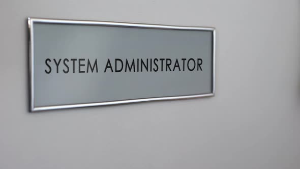 System Administrator Office Door, Hand Knocking Closeup, Installing Software alt