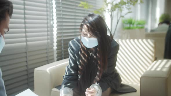 Businessmen are Discussing the Project at a Meeting alt