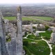 Drone flying through and over legendary ruins of Corfe castle, County Dorset in England. Aerial appr - VideoHive Item for Sale