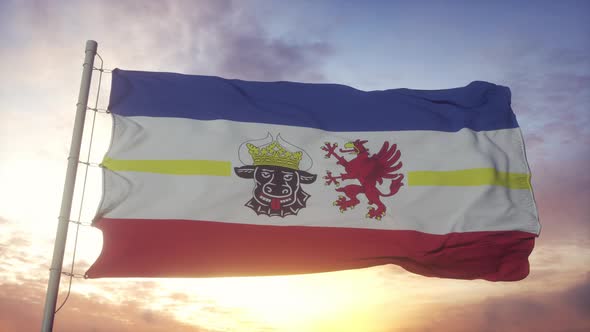 Mecklenburg-Western Pomerania flag, Germany, waving in the wind, sky and sun background alt