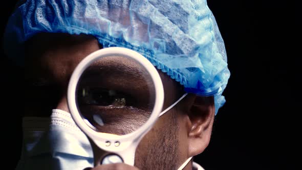 Lab Tech with Magnifying Glass  alt