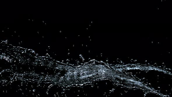 Super Slow Motion Shot of Twisting Water Splash at 1000Fps Isolated on Black Background alt