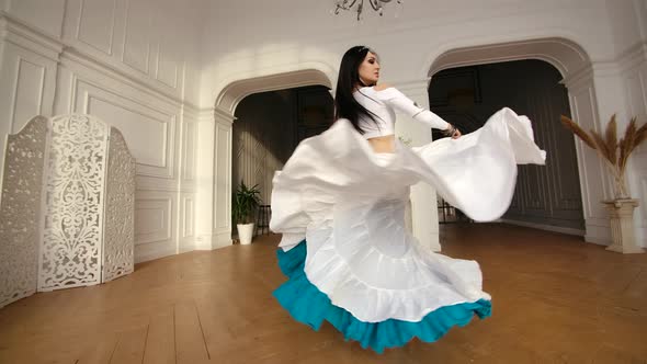 Woman Belly Dancing in Beautiful Eastern Ethnic Oriental Dress alt