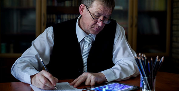 Business Man Working On Digital Tablet 3