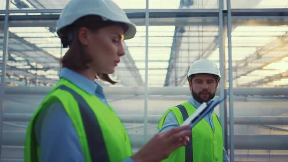 Engineering Experts Empty Factory Checking Product Perspective Process Talking alt