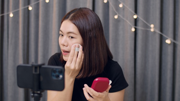 Young Asian woman beauty blogger influencer makeup artist.