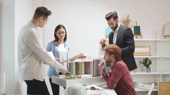 Creative Confident Team of Engineers Working Together in Architect Studio. alt