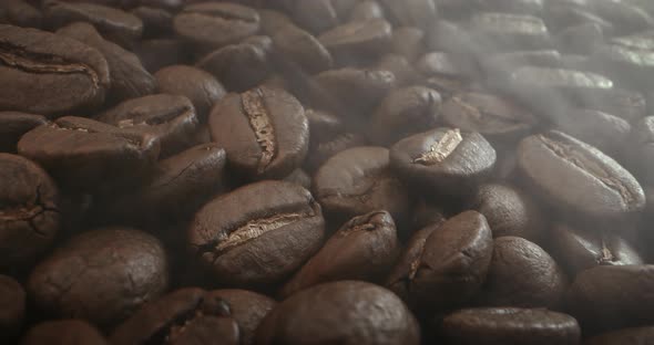 Macro Shot Roasting Coffee Beans Filmed in a Dark Key the Smoke Emanating From the Roasting of alt