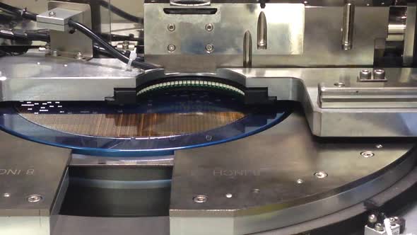 Pick up silicon die wafer in semiconductor manufacturing, Motion video of pickup silicon wafer. alt