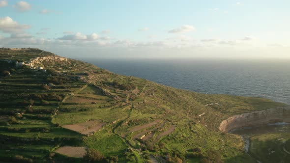 AERIAL: Revealing White Cliffs of Malta Coastline During Winter near Mediterranean Sea