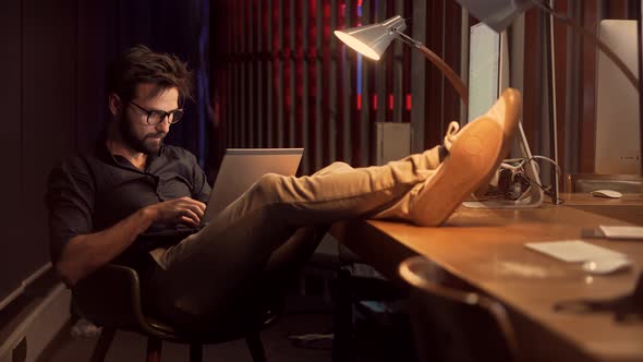 Businessman Working In Office.Boss Work On Worplace.Lawyer Analyzing Charts On Laptop. alt