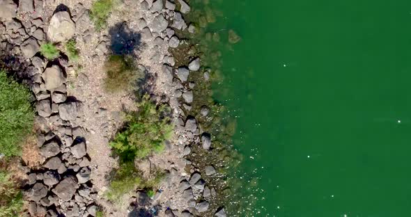 Stony Shore with Beautiful Turquoise Color of the Sea