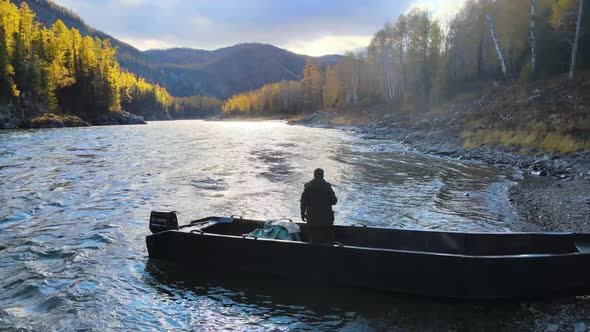 River Autumn Fisherman Fishing From a Boat Fishing Rod Sunny