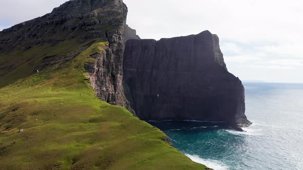 Part of a Series Aerial View of Famous Cliff in Faroe Islands alt