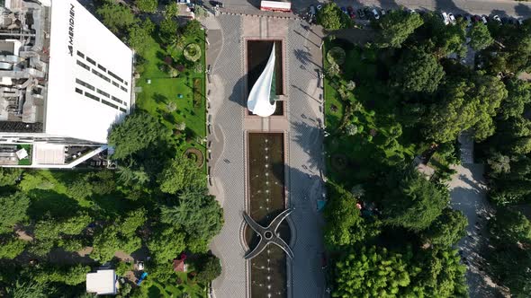 Aerial view of wedding palace and fountains near Technological university tower alt