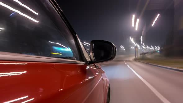 Drivelapse Urban Look From Fast Driving Car at a Night Avenue in a City Timelapse Hyperlapse alt