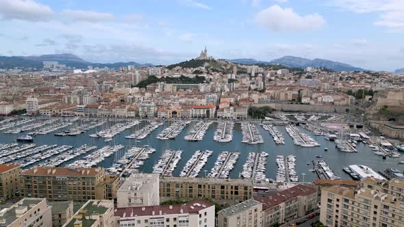 Drone flying towards "Notre-Dame de la Garde" basilica in Marseille, France alt