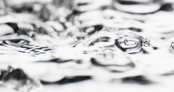 Abstract Bubbles Floating to Water Surface alt