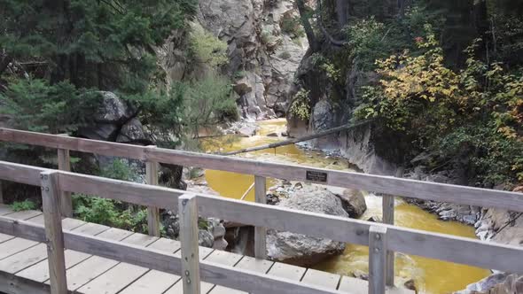 Aerial From River in Gorge to Overlooking Huge Dam and Mountain Valleys with Iconic Million Dollar alt