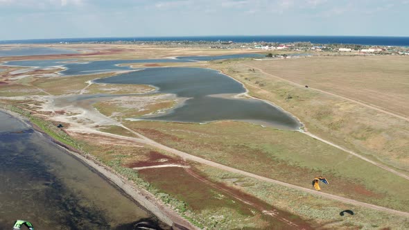 Beautiful flight in summer over salt lakes. Dry lakes. Green grass. alt