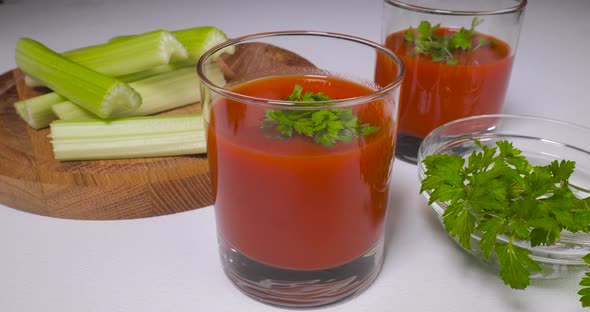 Glasses of Tomato Juice on Table alt