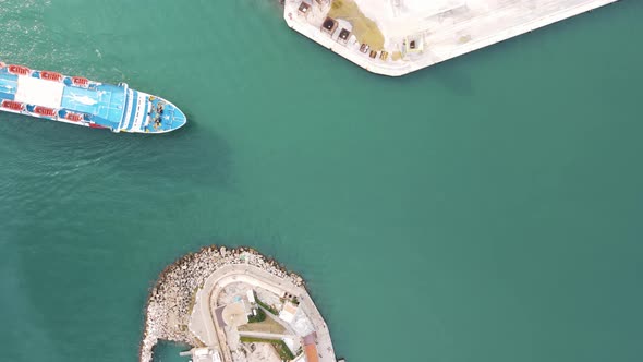 Aerial view of a Ferry Boat entering in Livorno port, Italy.