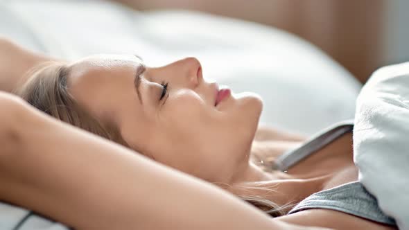 Adorable Morning Blonde Lady Perfect Skin Natural Beauty Stretching in Bed with Positive Emotion alt