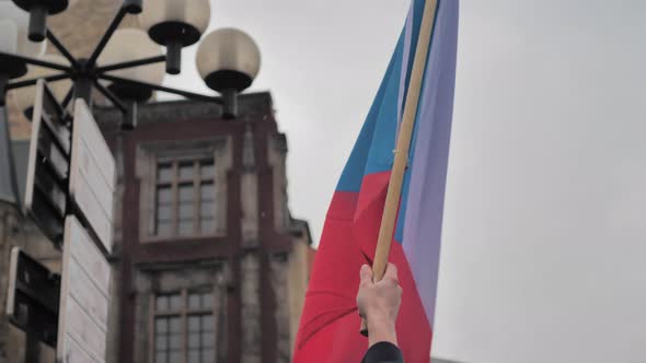 Czech Republic National Flag Waving in Hand of Man, Close Up Slow Motion alt