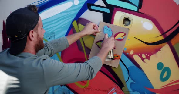 Graffiti artist painting with aerosol spray 4k, Stock Footage | VideoHive