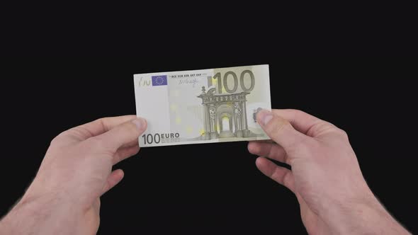 Male Hands Show Banknote of One Hundred Euros with Alpha Channel alt