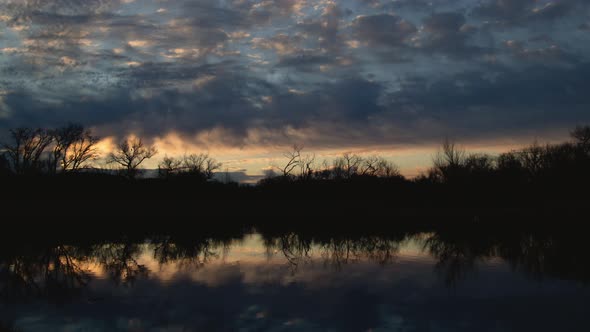 Brilliant Clouds Over Lake Before Sunrise Timelapse Medium Shot