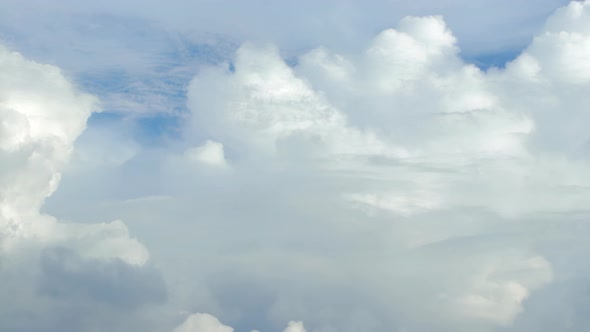Stunning Huge Cumulus Clouds Swirl in the Daytime