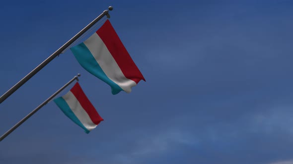 Luxembourg Flags In The Blue Sky - 4K