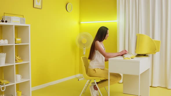 Woman Manager Is Working at Personal Computer alt