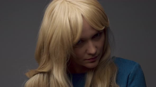 Nordic Blond Model in Studio with Dramatic Top Light alt